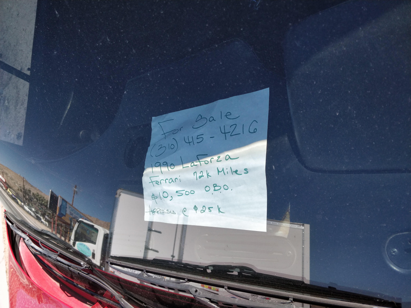Illustration for article titled Check Out This Laforza For Sale, Replete With Fake Ferrari Badges